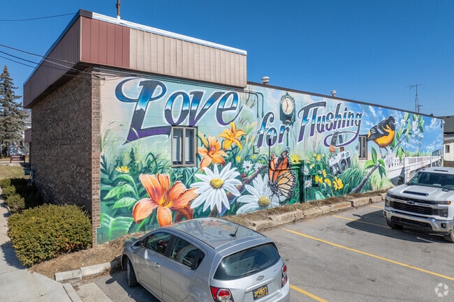 The Flushing Area Senior Center welcomes visitors to the downtown area with a colorful mural.