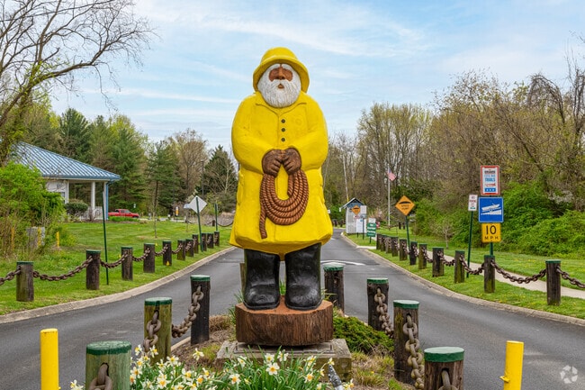 A statue of a fisherman greets residents into Mariner Point Park in Joppa.