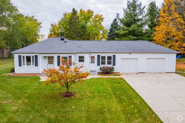 Ranch-style homes in North Prairie often include multiple garages and wide driveways.