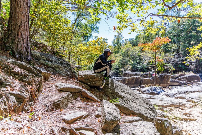 Residents of Grove Hill can easily unwind at nearby Chewacla State Park, where peaceful spots to sit and relax are just a short walk away.