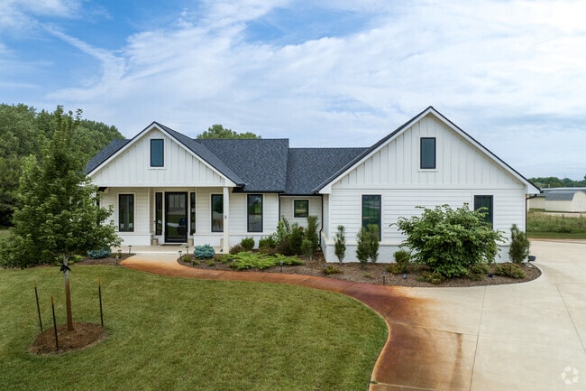 Valley Center has a few white modern farmhouses.