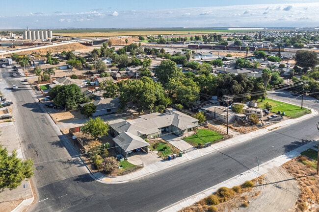 Many mid-20th century homes in Goshen have moderately sized front yards.