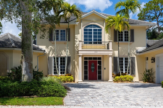 A colorful multi-level traditional family home in Breakers West neighborhood.