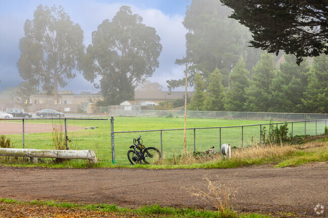 Green Hills Elementary School has a sports field in the trees.