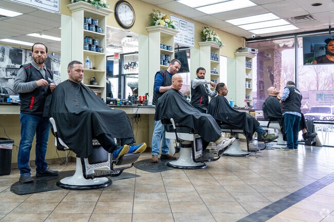 Patrons of Goodfellas Barber Shop get their haircut and shave on Harlem Ave. in Worth.