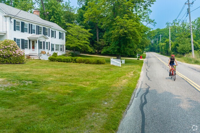 Cyclists enjoy winding routes through Old Field’s tree-lined streets and coastal scenery.