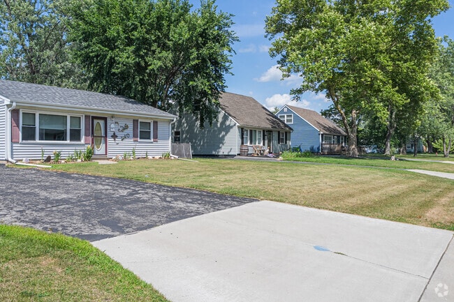 Ranch-style homes sit next to colorful Cape Cods on quiet streets in South Haven.