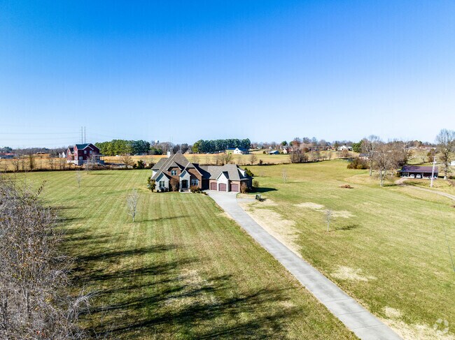 There are large brick homes on large lots in Portland.