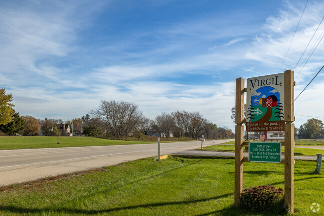 The Virgil town sign is located right near Chuck's Bar and Grill in Virgil.