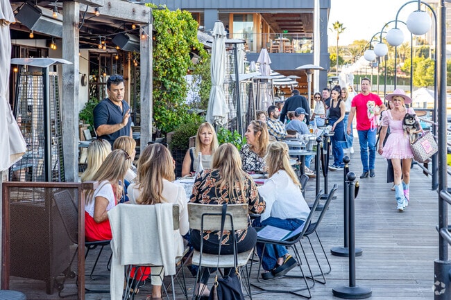 Outdoor dining with great views of the water is plentiful in Newport Beach City.
