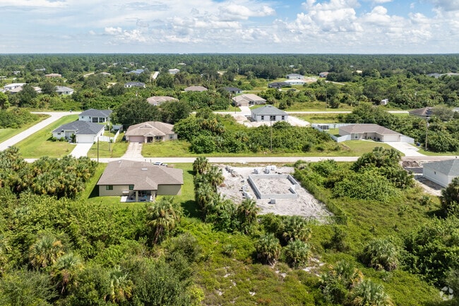 Residents of Eisenhower, Ft. Myers enjoy their privacy and foliage facade.