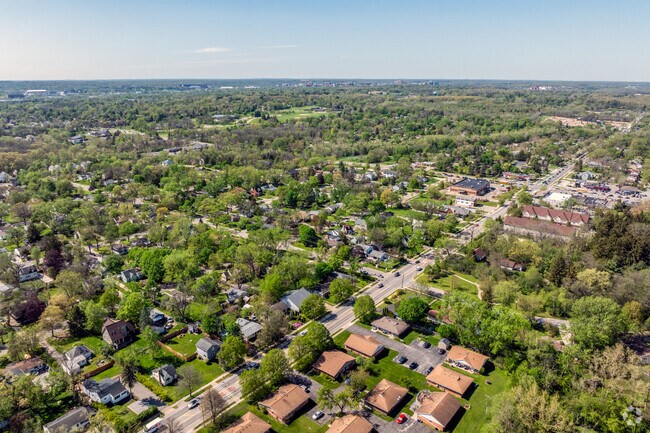 This aerial photo of a neighborhood in Southeast Ann Arbor shows downtown in the distance.