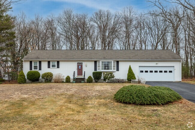 This ranch style home in Gospel Hill shows off its impressive shrubbery.