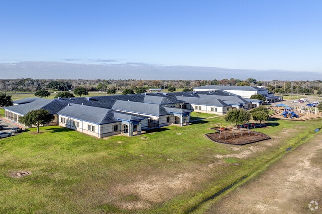 The school's beloved mascot, the Royal Wrangler, embodies the spirit of the West.