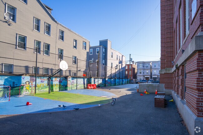 The schoolyard for James Otis Elementary School is behind the building in East Boston.