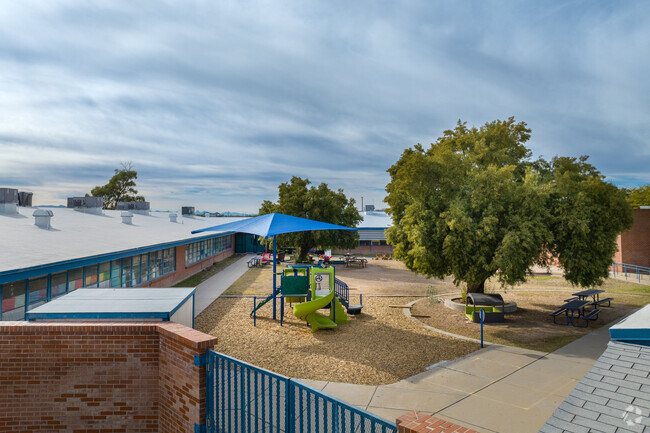 Lillian Cavett Elementary School in tucson arizona has an open campus with trees and playgrounds