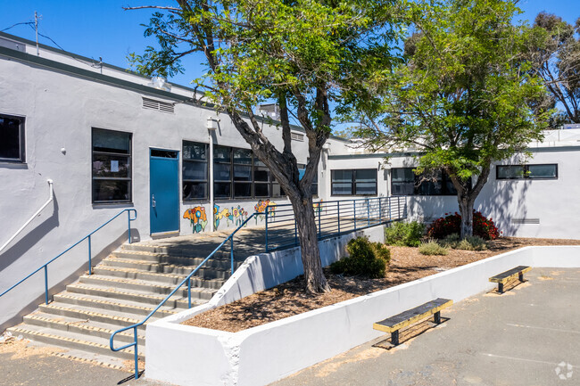 A sitting area is located near the office entrance at Highland Elementary.