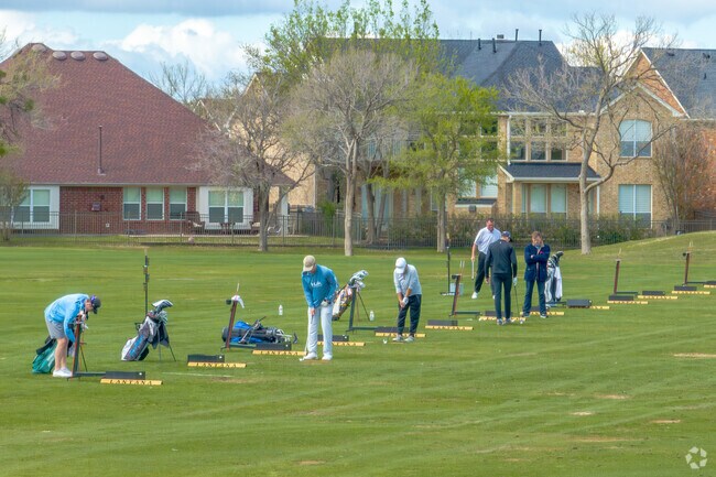 Just outside Double Oak, Lantana Golf Club anchors the community with championship greens.
