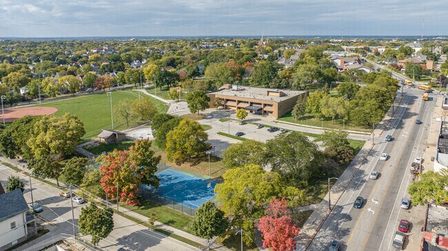 Play some basketball or baseball at Harambee's Rose Park.