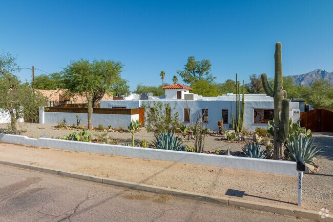 A touch of the Southwest graces North Dodge with this intriguing ranch home.