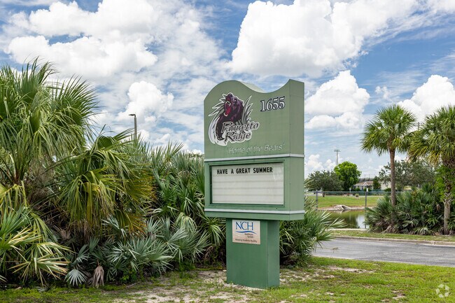 Palmetto Ridge High School in Naples welcomes students with a large sign at the entrance.