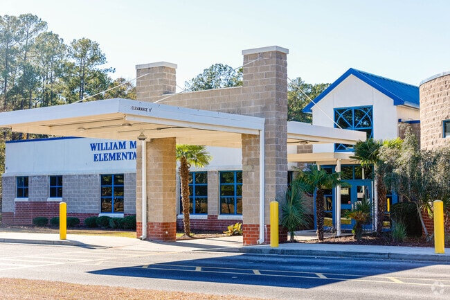 William M. Reeves Elementary School welcomes children through the front doors.