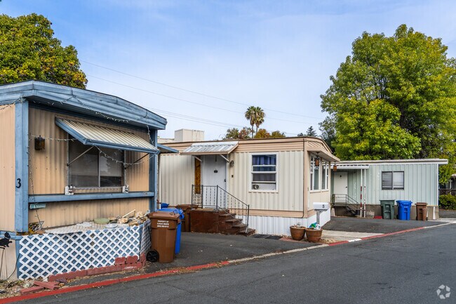 Enjoy a peaceful lifestyle at The Trees Mobile Home Park near Tree Haven.