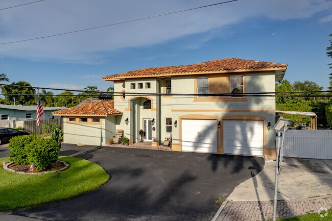 A charming split-level home in Lake Clarke Shores, FL.