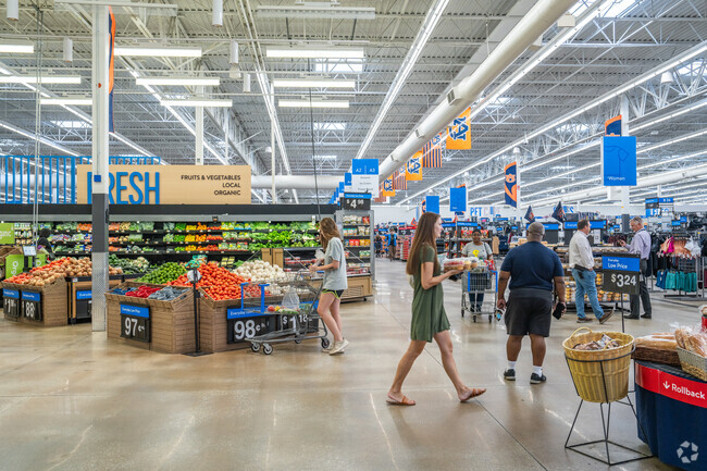 You can satisfy your grocery needs at the local Walmart near Harmon Estates.