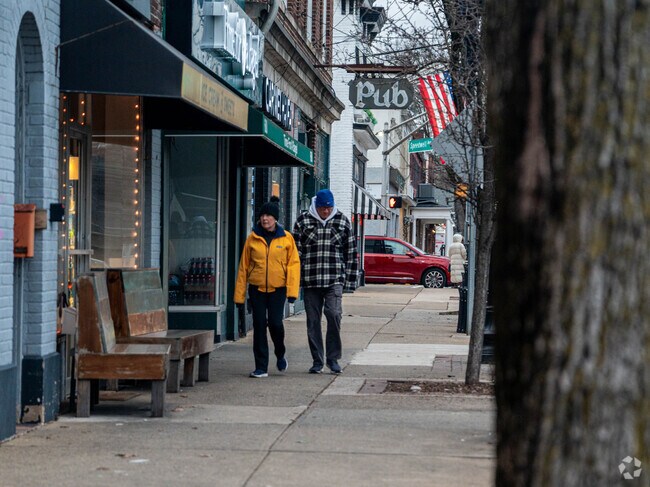 Residents walk along the main street of Morris Plains to grab a bite to eat.