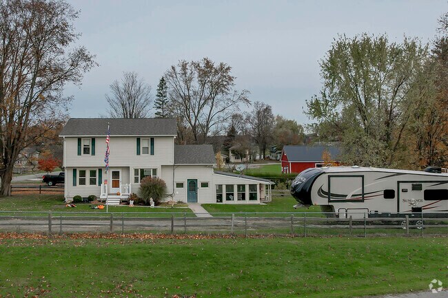 The Collins community has some older and newer home like this colonial revival home.