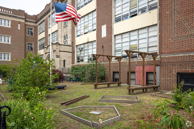 A garden in the front of the Lafayette Street School, Newark, NJ