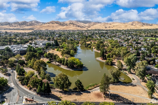 Serene waters and stunning views await at Los Mendanos Lake, a hidden gem of nature.