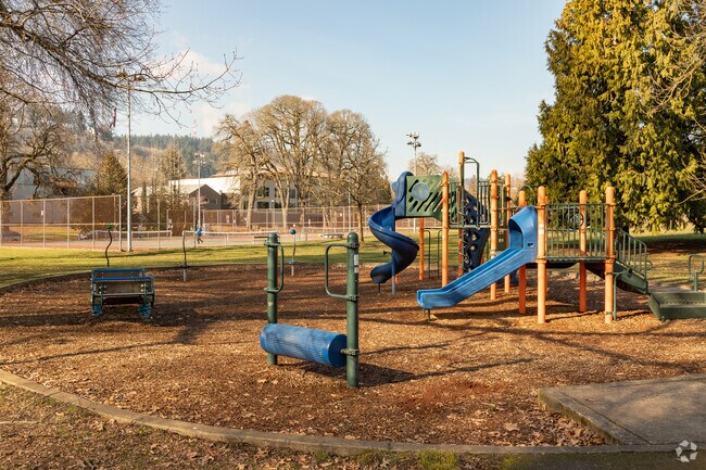 Play structure and tennis courts is a great place for kids to play at Willamette Park, Oregon.