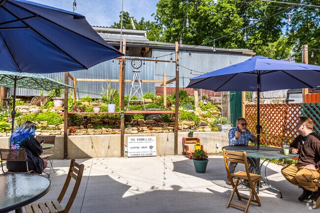 The Windmill has an amazing patio filled with plants and seating.