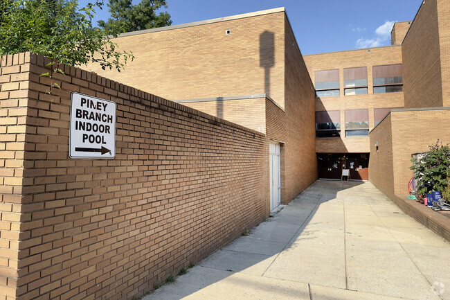Resubmitted in 3:2 format - Side entrance to school, and entrance to pool.