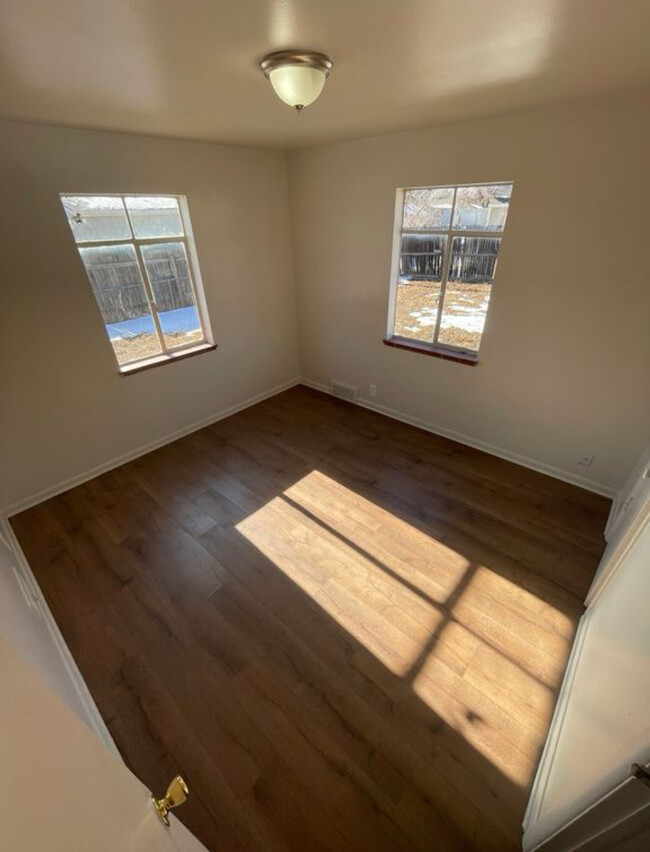 Sunny primary bedroom