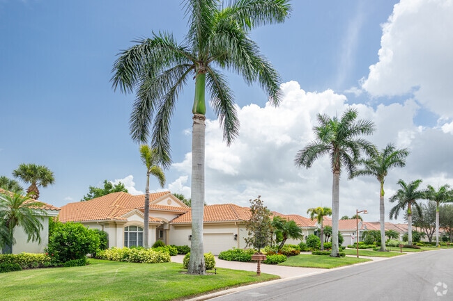 The Brooks features rows of Mediterranean style homes with lush palm trees.