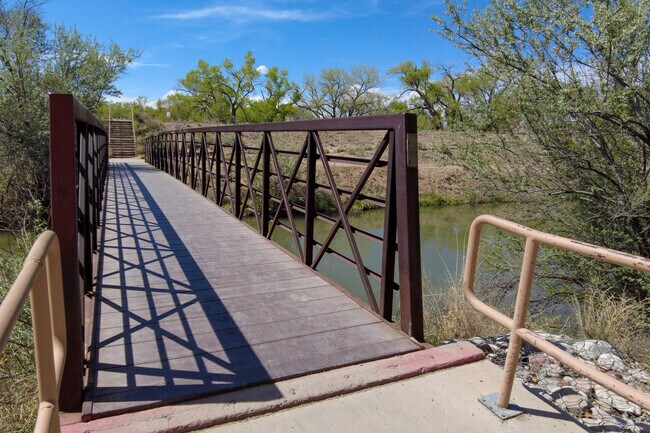 Bridge crossing a canal from Rio Grande Nature Center State Park to Paseo del Bosque trail.