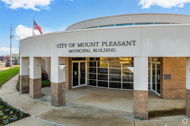 Mount Pleasant’s Municipal Building, with the American flag flying high, ensures safety and security for all who live and visit the city.