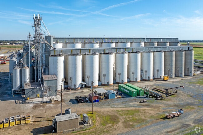 Large silos highlight the importance of agricultural production in the Madera Acres area.