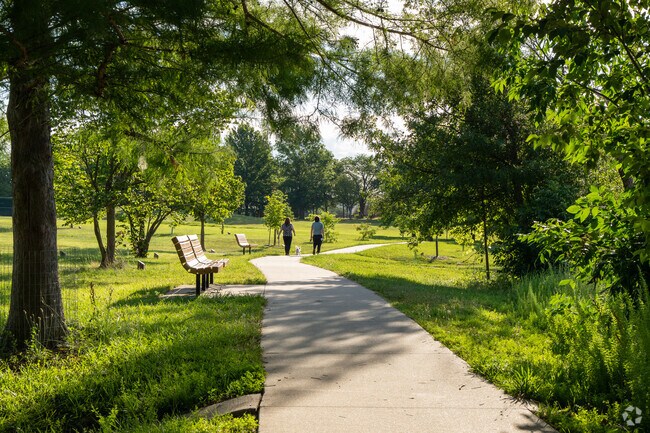 Stroll along the paved walking trail at Cosmo-Bethel Park.