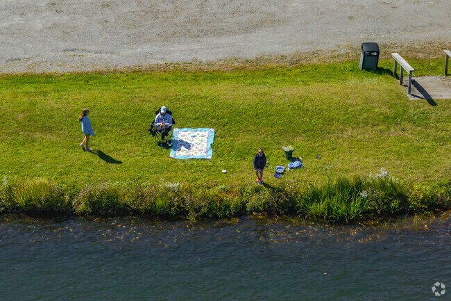 A family enjoys an afternoon at Long Meadow Pond Recreation Area.