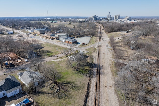 The early 20th-century railroad boom in Oklahoma helped communities like Ada grow.