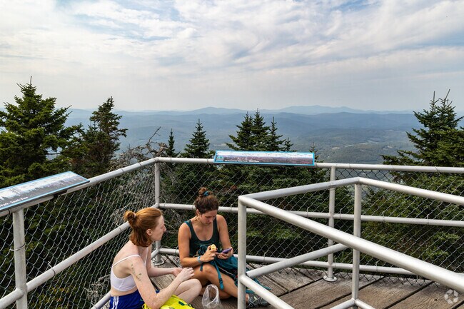 Enjoy a snack on the fire tower at the top of Mt. Ascutney State Park.