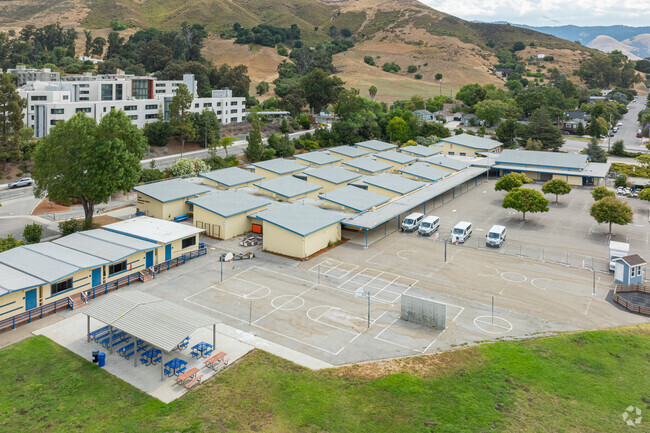 Teach Elementary School provides large green areas and play areas for students to enjoy.