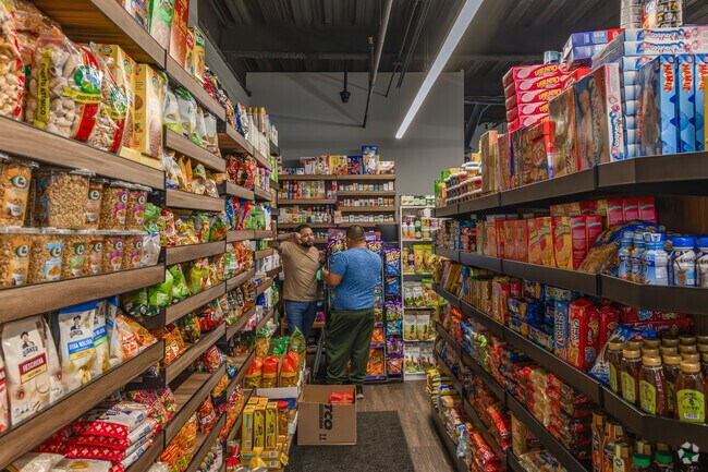 Shop for groceries at Hat City Market on Main Street.