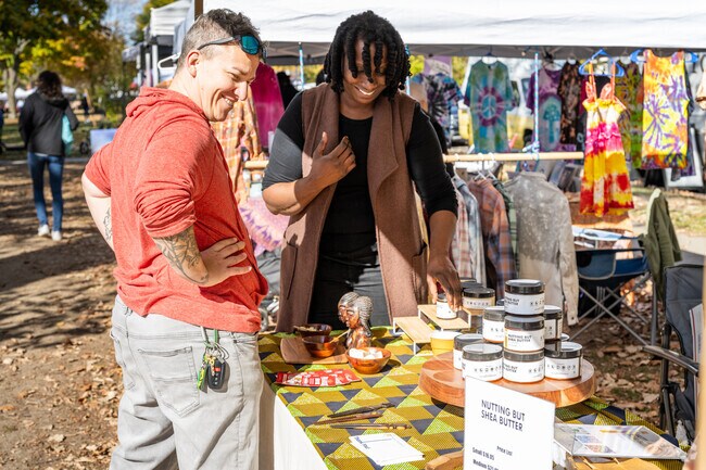 Weekend shoppers browse handmade goods at Providence Artisans Market in October.