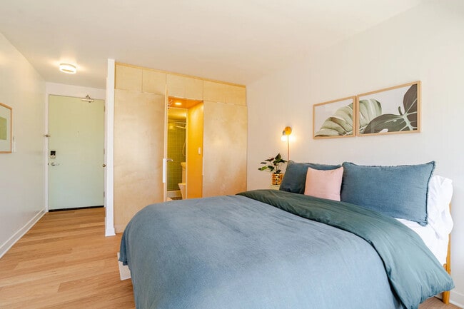 Bathroom door cleverly concealed in the wardrobe wall