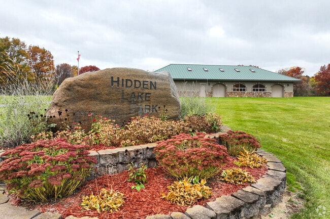 A welcoming sign greets visitors at Hidden Lake Park in Saint Augusta.